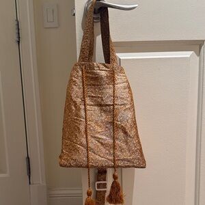 Elegant Gold Drawstring Women's Bag